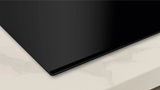 Neff T58FHW1L0 N70 80cm 5-Zone Induction Hob with Twist Touch® from HomeWise Appliances. Stock photo of a bevelled corner.