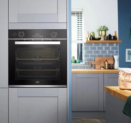 Beko Recycled Net® BBIS25300XC (61) Built-in Electric Single SimplySteam™ Oven with AeroPerfect™ - A Rated from HomeWise Appliances stock photo in a kitchen display