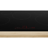 Bosch Series 6 PIV831HB1E 80cm 5-Zone Induction Hob in Black - Wi-Fi Enabled  close of the hob surface showing the controls illuminated.
