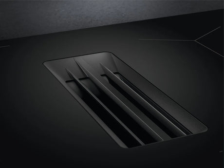 AEG Series 7000 NCH84C23AB 80cm Induction Hob with Venting Extraction and SenseFry® in Matt Black - A+ Rated. Stock photo close up of the cast iron cover for venting extraction.